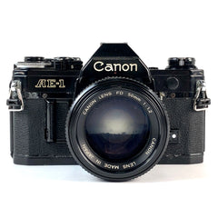 キヤノン Canon AE-1 ブラック + New FD 50mm F1.2 ［ジャンク品］ フィルム マニュアルフォーカス 一眼レフカメラ 【中古】