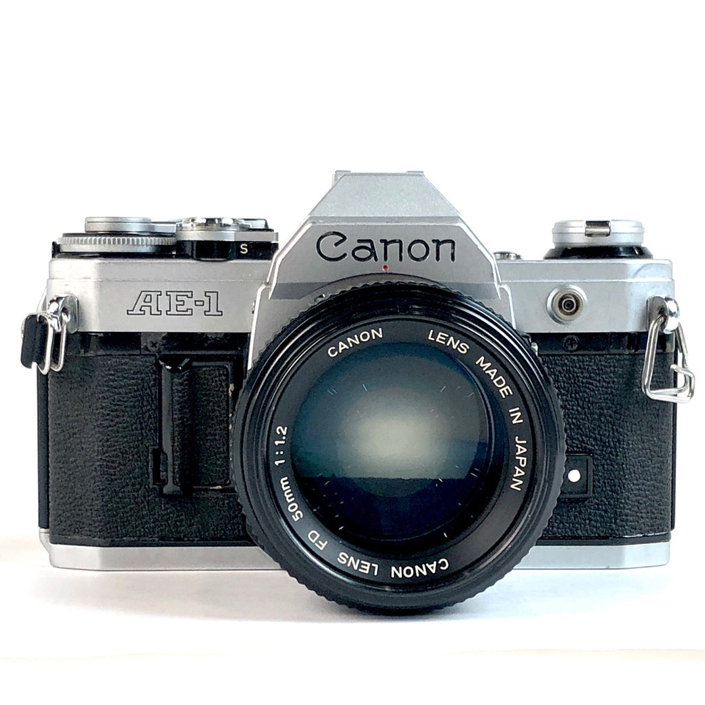 キヤノン Canon AE-1 + NEW FD 50mm F1.2 フィルム マニュアルフォーカス 一眼レフカメラ 【中古】