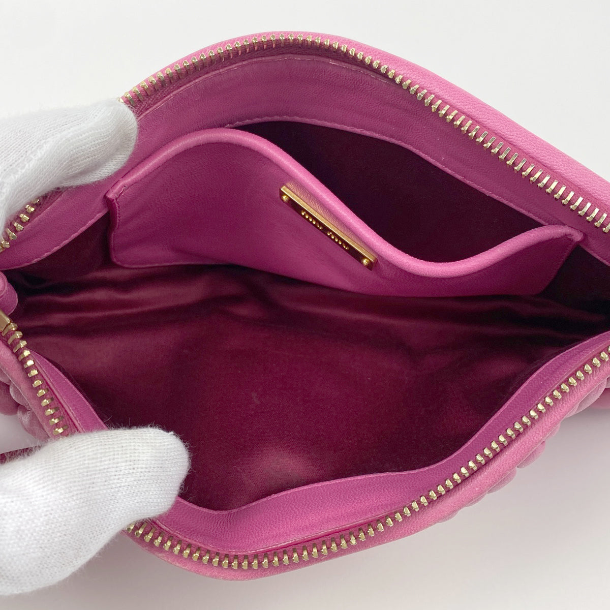 MIU MIU クラッチバッグ ピンク Miu Miu ロゴ クラッチバッグ | ピンク | FARFETCH JP