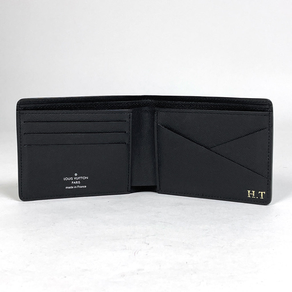 ルイ・ヴィトン ミュルティプル ガストンラベル 札入れ 二つ折り財布 エピ ノワール(ブラック) M69188 メンズ 【中古】brbag
