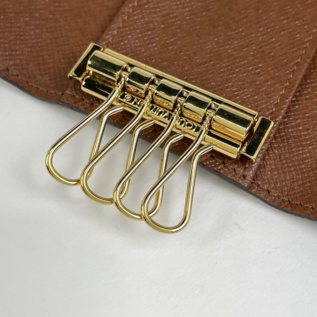 ルイ・ヴィトン ミュルティクレ 4 鍵入れ キーフック キーホルダー キーケース モノグラム ブラウン M69517 レディース 【中古】brbag