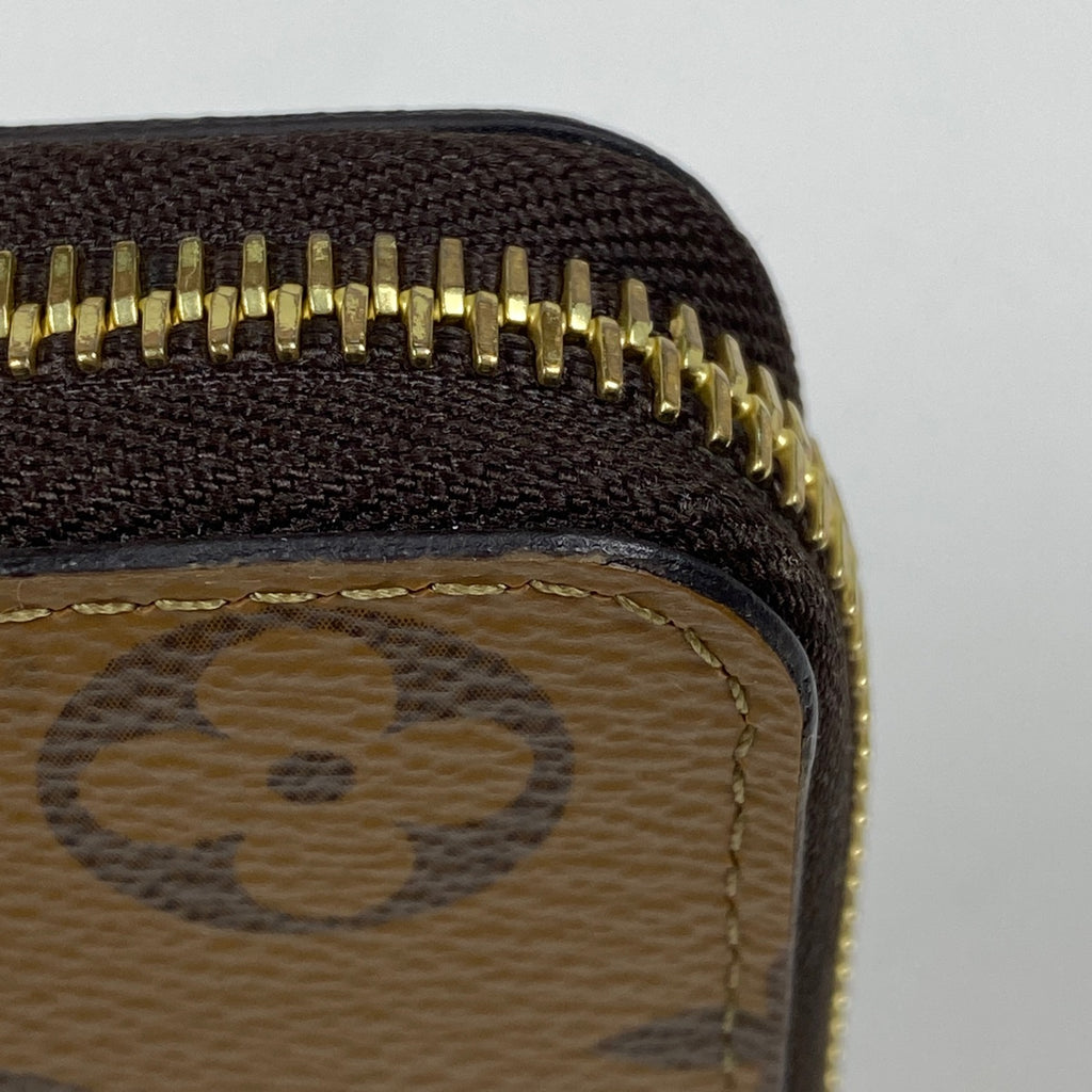 ルイ・ヴィトン ポルトフォイユ クレマンス ラウンドファスナー 長財布 モノグラムリバース ブラウン M82336 レディース 【中古】brbag