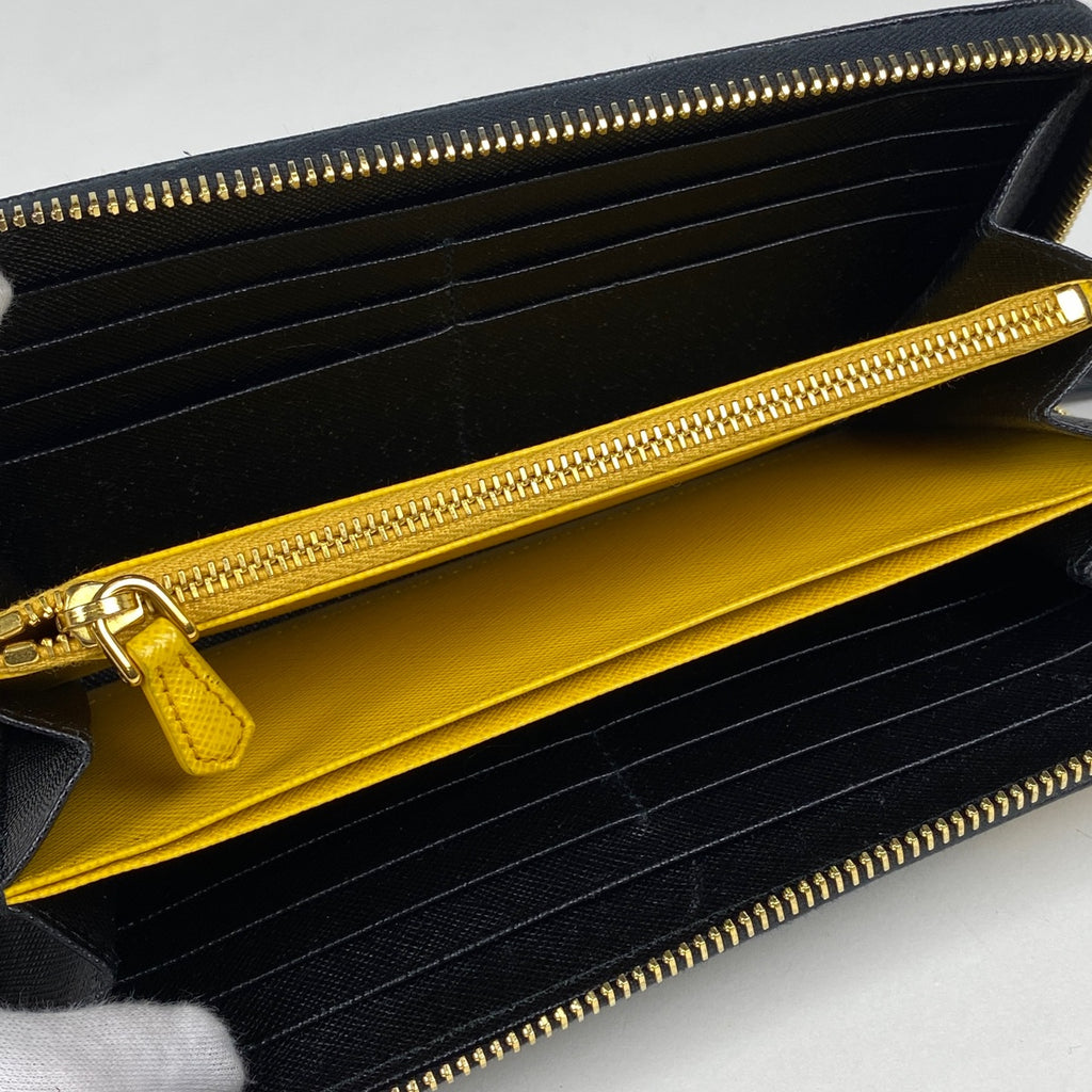 プラダ ロゴプレート ラウンドファスナー 長財布 ラウンドジップ ロボット 長財布 サフィアーノレザー ネロ(ブラック) 1ML506 レディース 【中古】brbag