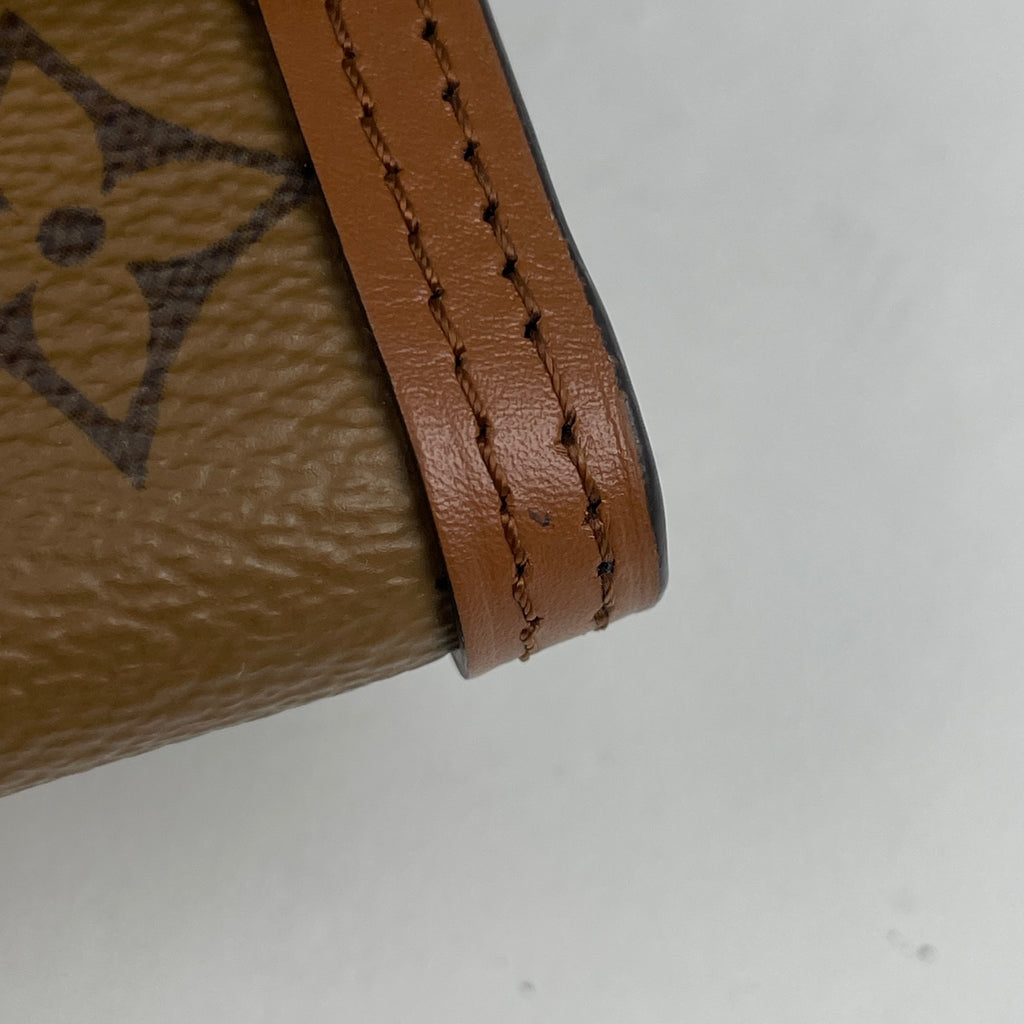 ルイ・ヴィトン ポルトフォイユ ドーフィーヌ コンパクト 札入れ 小銭入れ 三つ折り財布 モノグラム ブラウン M68725 レディース 【中古】brbag