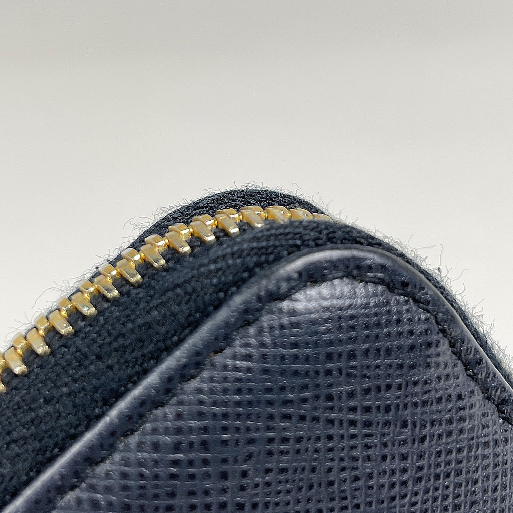 プラダ ロゴプレート L字ファスナー 長財布 札入れ 小銭入れ 長財布 サフィアーノレザー ネイビー レディース 【中古】brbag