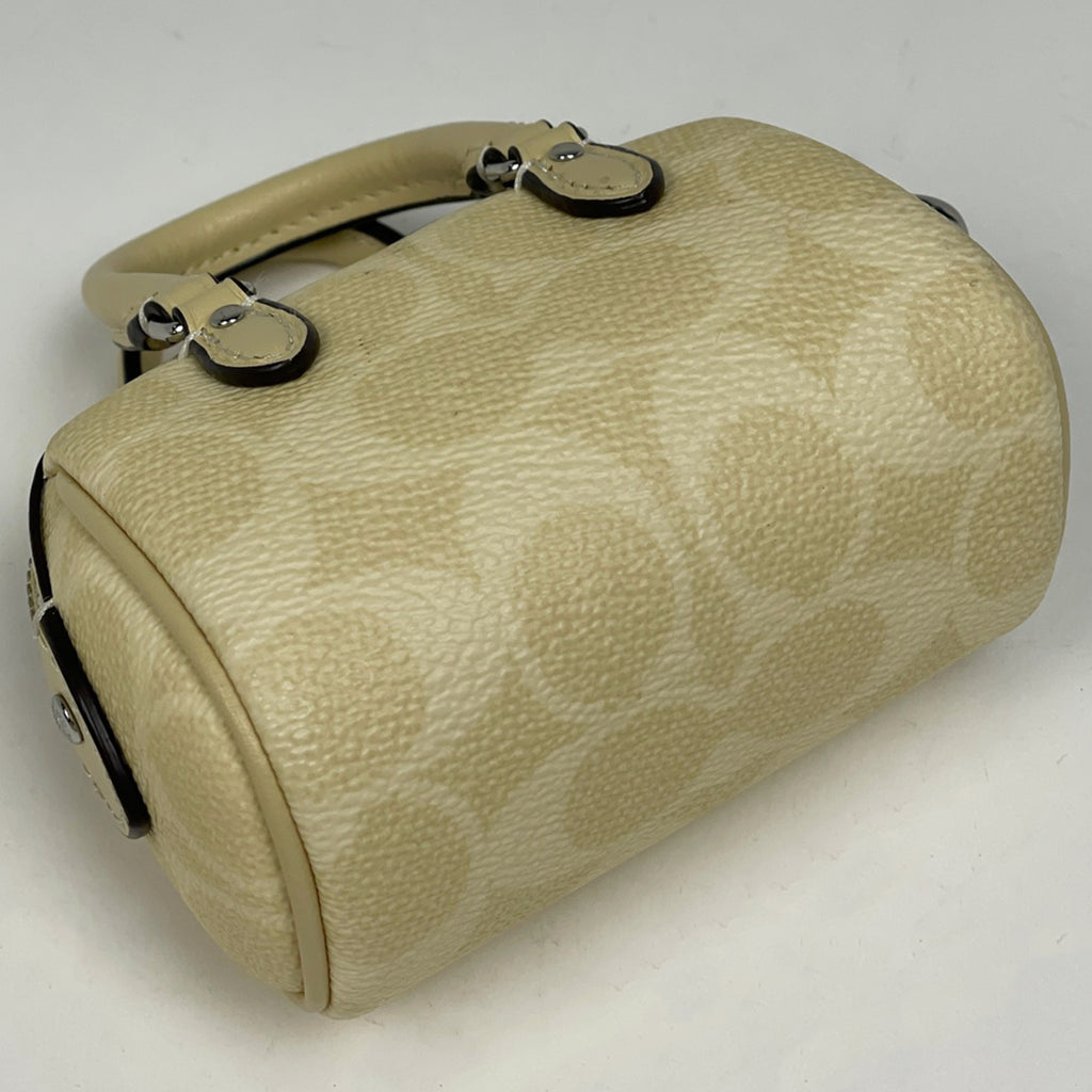 コーチ シグネチャー ミニ ローアン バッグ チャーム コーティングキャンバス クリーム CX068 レディース 【中古】brbag